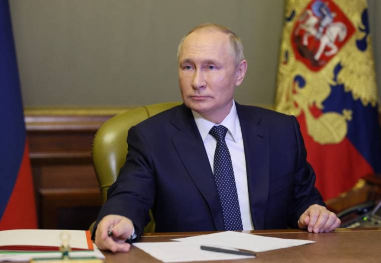 Vladimir Poutine à Saint-Petersbourg, en Russie, le 10 octobre 2022. ( SPUTNIK / GAVRIIL GRIGOROV )