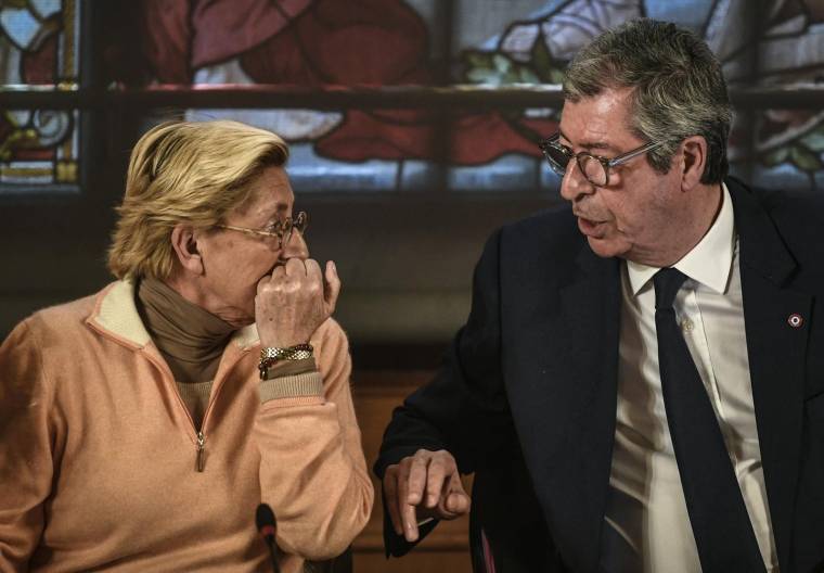 Isabelle et Patrick Balkany, à Levallois-Perret, en 2019 ( AFP / STEPHANE DE SAKUTIN )