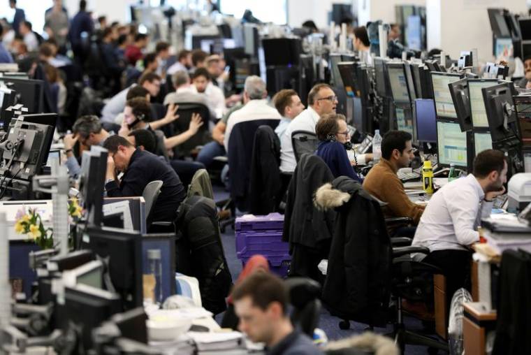 File photo of traders in London, Britain