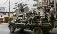 Des combattants du M23 circulent dans un véhicule ayant appartenu aux Forces armées de la République démocratique du Congo (FARDC) lors d'une patrouille dans les rues de Goma, le 29 janvier 2025 en RDCRwanda-backed fighters controlled almost all of the DR Congo city of Goma on January 29, 2025 where residents were re-emerging after days of deadly fighting and Angola urged leaders of both countries to urgently hold peace talks. After intense fighting that saw the M23 armed group and Rwandan troops seize the city's airport and key sites, calm returned to the mineral trading hub. ( AFP / - )