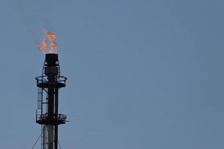 ExxonMobil a profité de de la diminution de l'offre russe ( AFP / DAMIEN MEYER )