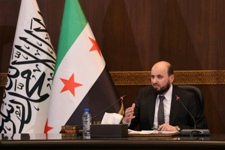 Une photo fournie par la chaîne Telegram de l'agence de presse syrienne Sana montre le Premier ministre chargé de la transition en Syrie, Mohammad al-Bachir, présidant une réunion du nouveau cabinet à Damas, le 10 décembre 2024 ( SANA / STRINGER )