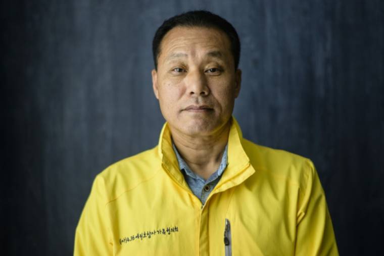 Kim Jong-gi, père de Kim Soo-jin, l'une de victimes du naufrage du ferry de Sewol survenu le 16 avril 2014, lors d'une interview avec l'AFP le 15 avril 2024 à Séoul ( AFP / ANTHONY WALLACE )