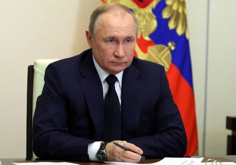 Vladimir Poutine à Moscou, en Russie, le 23 mars 2022. ( SPUTNIK / MIKHAIL KLIMENTYEV )