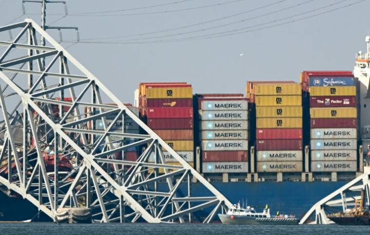 Le pont de Baltimore percuté par un porte-conteneurs alors que les opérations de nettoyage commencent, le 29 mars 2024, aux Etats-Unis ( AFP / Mandel NGAN )
