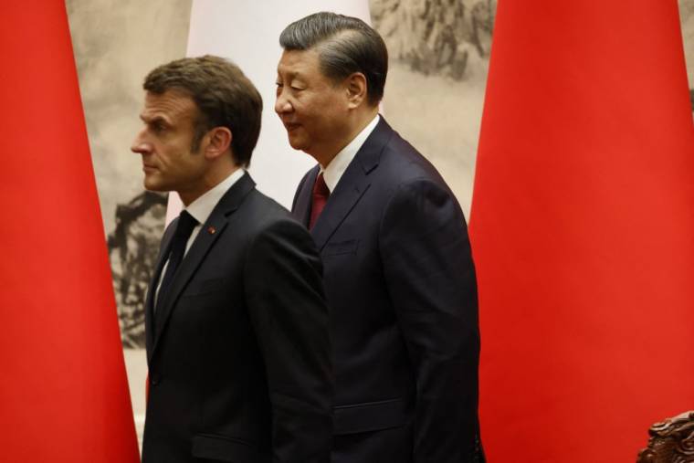 Emmanuel Macron et Xi Jinping, à Beijing, en avril 2023 ( AFP / LUDOVIC MARIN )