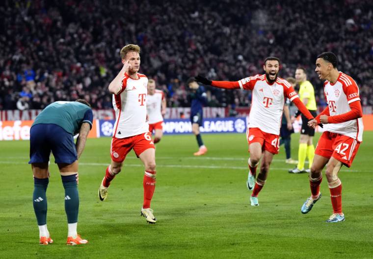 Bayern Munich's Joshua Kimmich (second left) celebrates scoring their side's first goal of the game during the UEFA Champions League quarter-final, second leg match at the Allianz Arena, Munich. Picture date: Wednesday April 17, 2024.   - Photo by Icon Sport