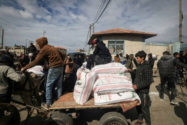 Distribution d'aide alimentaire à Rafah, dans le sud de la bande de Gaza, le 28 janvier 2024 ( AFP / - )